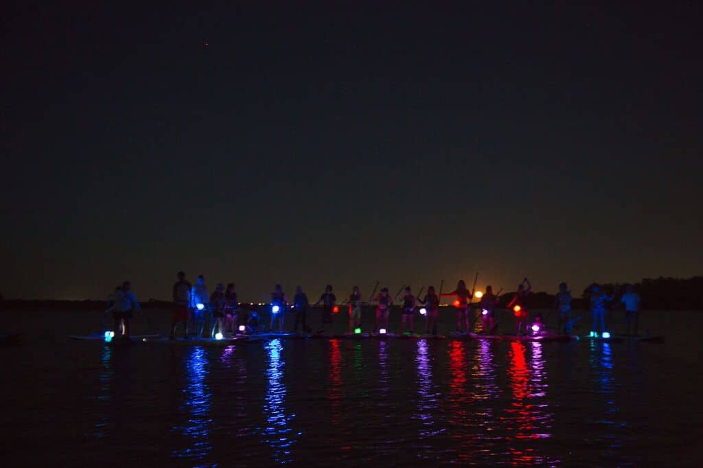 Glow on the lake at Full Moon Paddle event