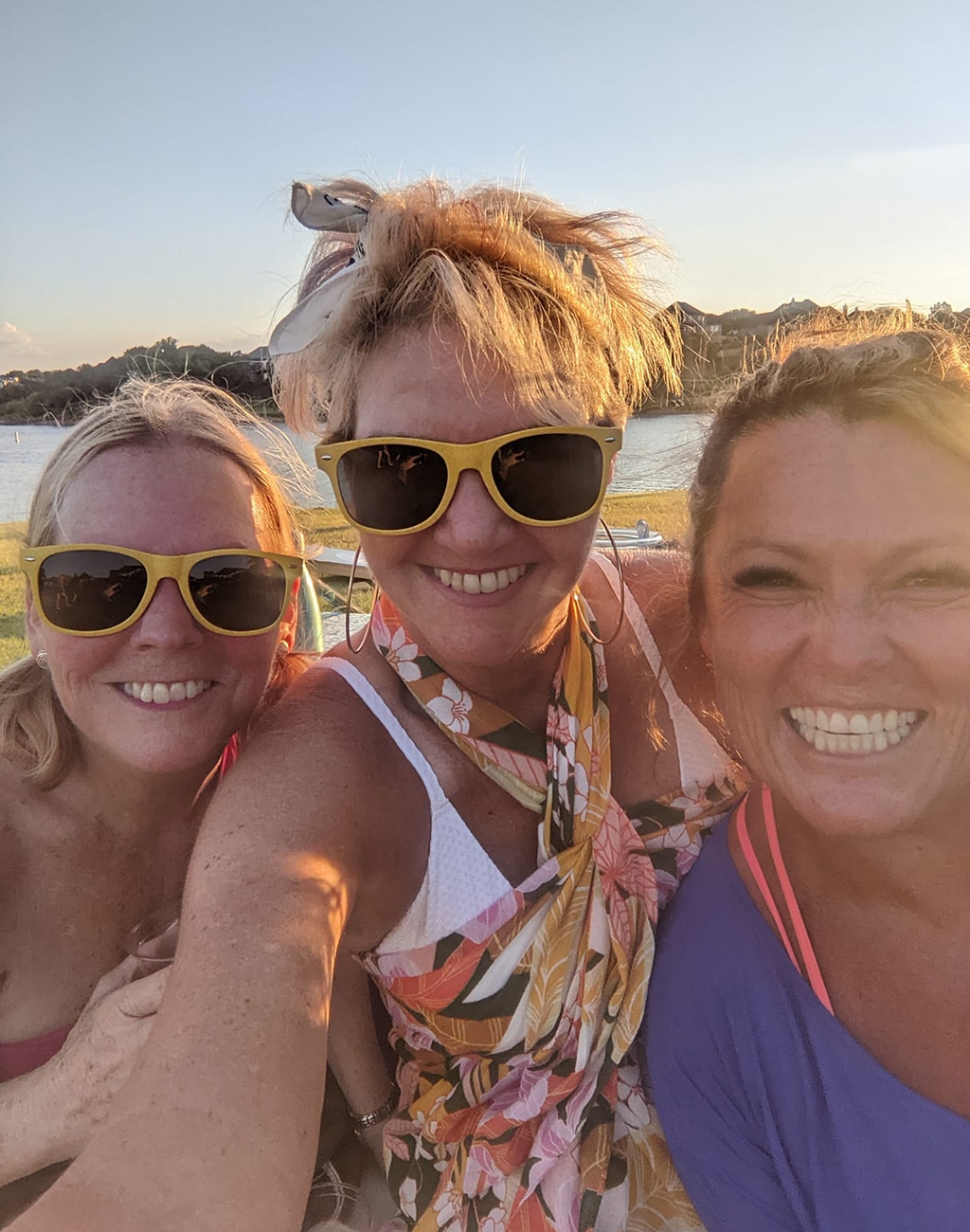 3 ladies at SUP Sisters Sunset Paddle event